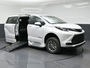 White Toyota Sienna with BraunAbility Side Entry Automatic Fold Out conversion