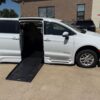 White Chrysler Voyager with BraunAbility Side Entry Automatic Fold Out conversion