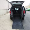 Black Dodge Grand Caravan with BraunAbility Rear Entry Manual Fold Out conversion