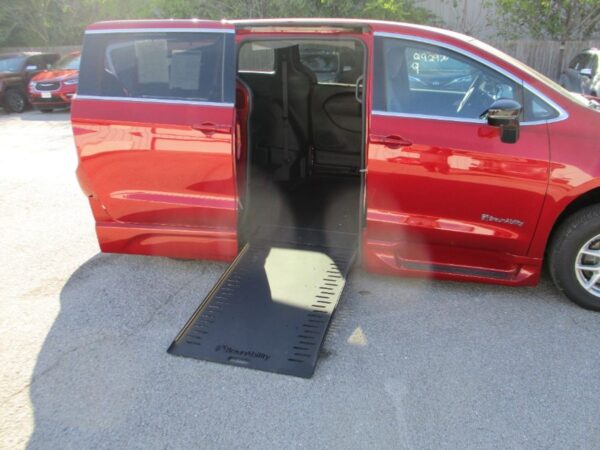 Red Chrysler Pacifica with BraunAbility Side Entry Automatic In Floor conversion