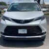 White Toyota Sienna with BraunAbility Side Entry Automatic Fold Out conversion
