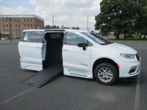 White Chrysler Pacifica with BraunAbility Side Entry Automatic In Floor conversion