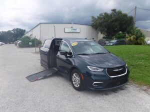 Blue Chrysler Pacifica with Driverge Side Entry Automatic Fold Out conversion