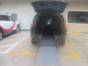 Black Chrysler Pacifica with Driverge Rear Entry Manual Fold Out conversion