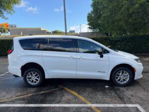 White Chrysler Pacifica with BraunAbility Rear Entry Manual Fold Out conversion