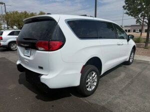 White Chrysler Voyager with FR Conversions Rear Entry Manual Fold Out conversion