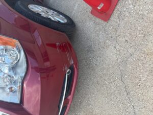 Red Chrysler Town and Country with Vantage Mobility Side Entry Automatic In Floor conversion