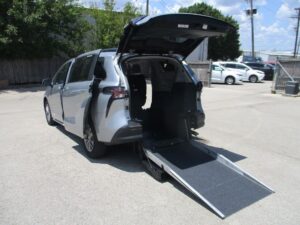 Silver Toyota Sienna with Driverge Rear Entry Manual Fold Out conversion