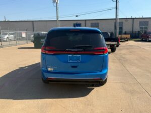 Blue Chrysler Pacifica with Driverge Side Entry Automatic Fold Out conversion