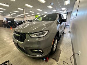 Grey Chrysler Pacifica with BraunAbility Side Entry Automatic Fold Out conversion