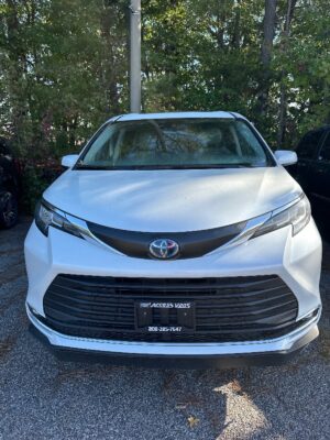 White Toyota Sienna with BraunAbility Side Entry Automatic Fold Out conversion