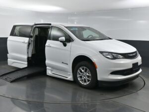White Chrysler Voyager with BraunAbility Side Entry Automatic Fold Out conversion