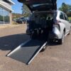 Silver Toyota Sienna with Driverge Rear Entry Manual Fold Out conversion