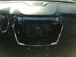 Blue Chevrolet Traverse with BraunAbility Side Entry Automatic In Floor conversion