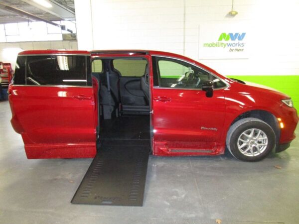 Red Chrysler Pacifica with BraunAbility Side Entry Automatic In Floor conversion