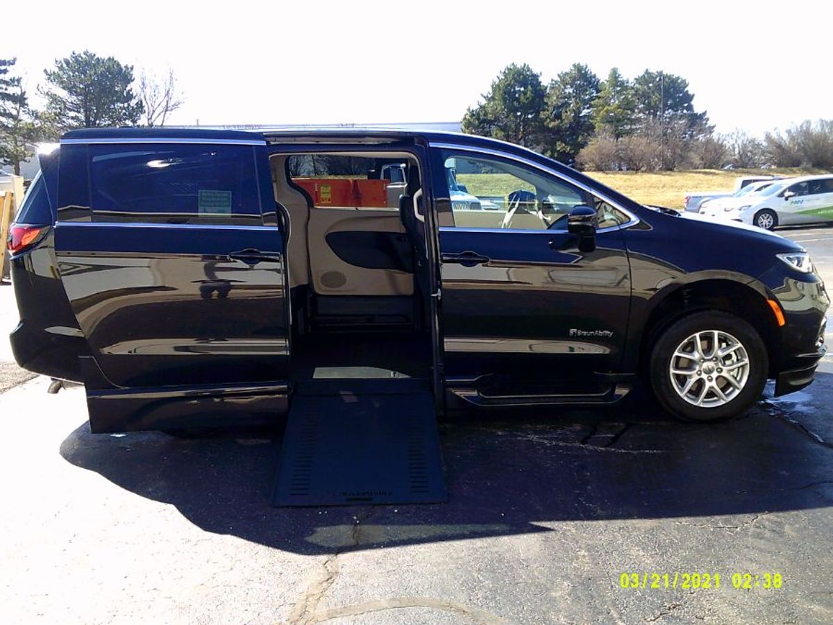 Black Chrysler Pacifica with BraunAbility Side Entry Automatic In Floor conversion