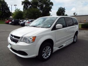 White Dodge Grand Caravan with BraunAbility Side Entry Automatic Fold Out conversion