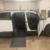 White Chevrolet Traverse with BraunAbility Side Entry Automatic In Floor conversion