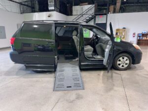 Black Toyota Sienna with BraunAbility Side Entry Automatic Fold Out conversion