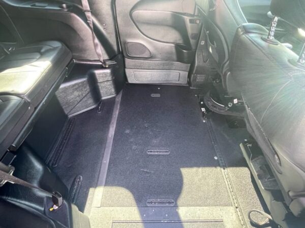 White Chrysler Pacifica with Vantage Mobility Side Entry Automatic In Floor conversion