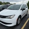 White Chrysler Voyager with BraunAbility Rear Entry Manual Fold Out conversion
