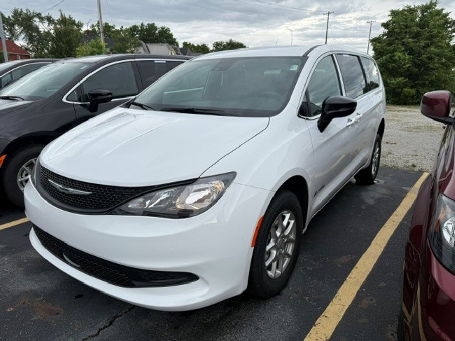 White Chrysler Voyager with BraunAbility Rear Entry Manual Fold Out conversion