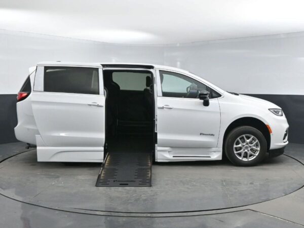 White Chrysler Pacifica with BraunAbility Side Entry Automatic Fold Out conversion