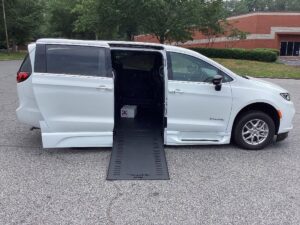 White Chrysler Pacifica with BraunAbility Side Entry Automatic In Floor conversion