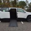 White Chevrolet Traverse with BraunAbility Side Entry Automatic In Floor conversion