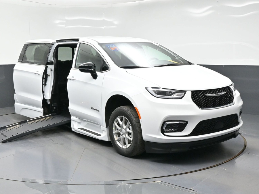 White Chrysler Pacifica with BraunAbility Side Entry Automatic Fold Out conversion