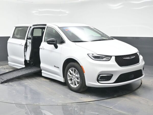 White Chrysler Pacifica with BraunAbility Side Entry Automatic Fold Out conversion