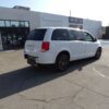 White Dodge Grand Caravan with Driverge Rear Entry Manual Fold Out conversion