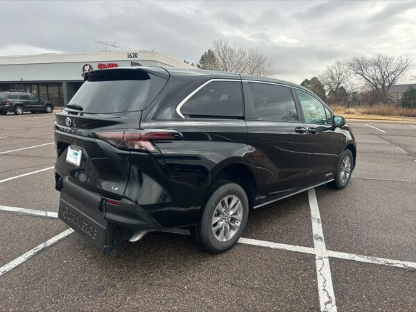Black Toyota Sienna with Driverge Rear Entry Manual Fold Out conversion