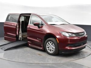 Red Chrysler Voyager with BraunAbility Side Entry Automatic Fold Out conversion