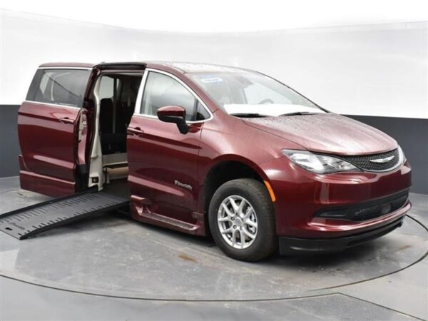 Red Chrysler Voyager with BraunAbility Side Entry Automatic Fold Out conversion