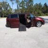 Red Honda Odyssey with BraunAbility Side Entry Automatic In Floor conversion