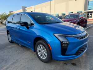 Blue Chrysler Pacifica with Driverge Side Entry Automatic Fold Out conversion