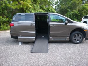 Silver Honda Odyssey with Vantage Mobility Side Entry Automatic In Floor conversion