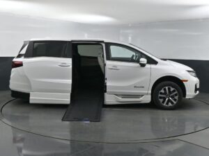 White Honda Odyssey with BraunAbility Side Entry Automatic In Floor conversion