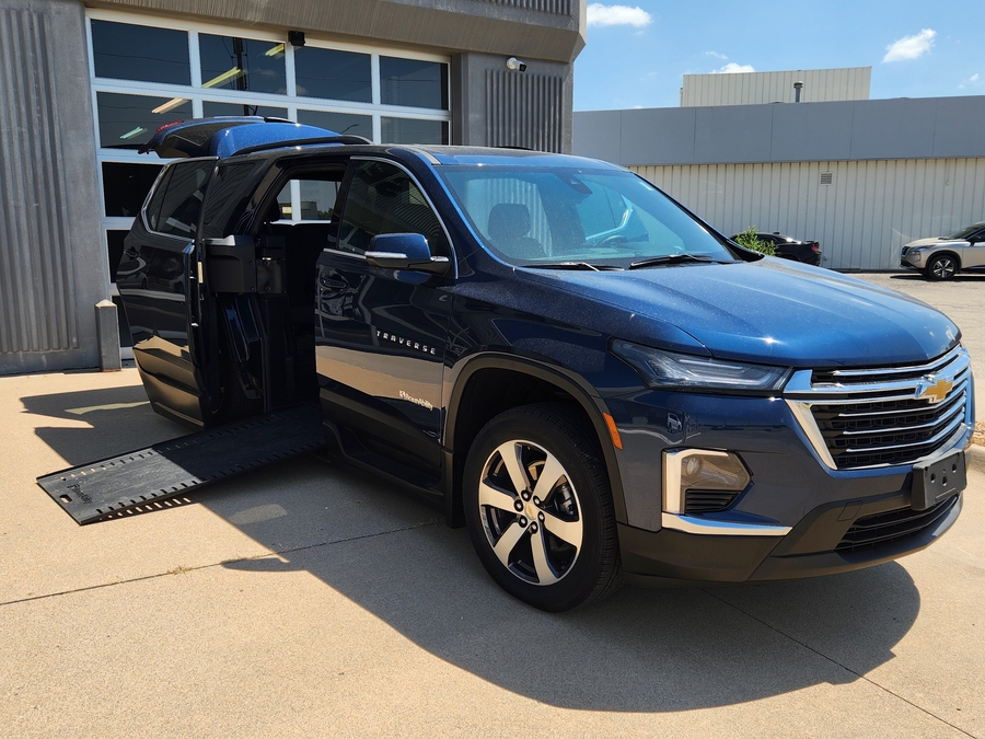 Blue Chevrolet Traverse with BraunAbility Side Entry Automatic In Floor conversion