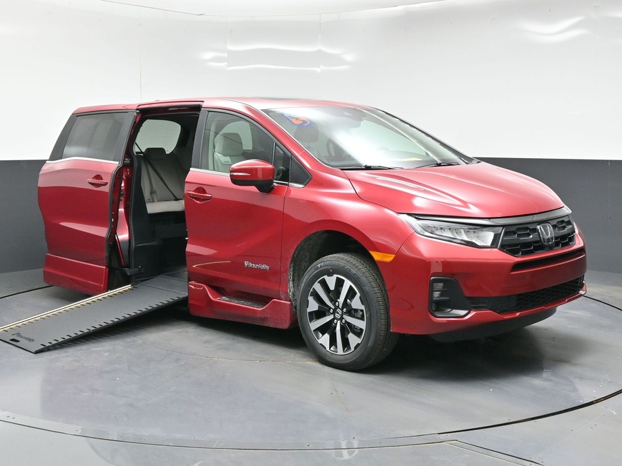 Red Honda Odyssey with BraunAbility Side Entry Automatic In Floor conversion
