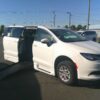 White Chrysler Voyager with BraunAbility Side Entry Automatic Fold Out conversion