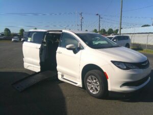 White Chrysler Voyager with BraunAbility Side Entry Automatic Fold Out conversion