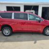 Red Chrysler Voyager with BraunAbility Rear Entry Manual Fold Out conversion