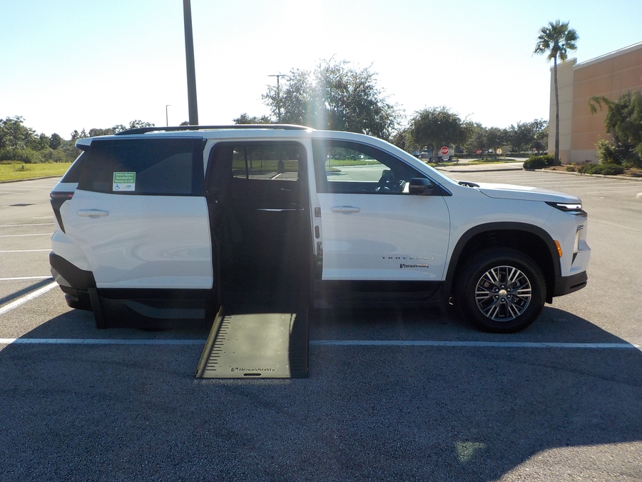 White Chevrolet Traverse with BraunAbility Side Entry Automatic In Floor conversion