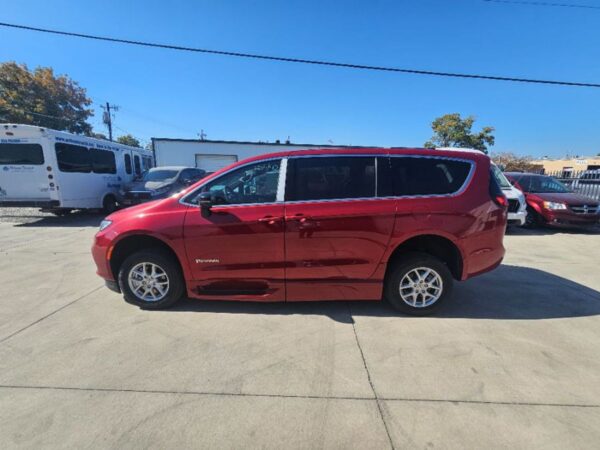 Red Chrysler Pacifica with BraunAbility Side Entry Automatic Fold Out conversion