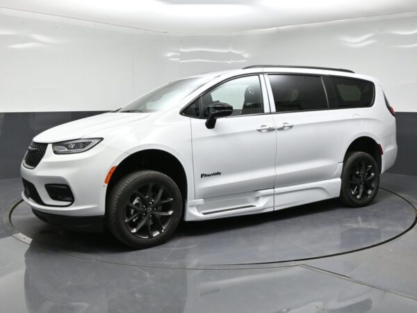White Chrysler Pacifica with BraunAbility Side Entry Automatic Fold Out conversion