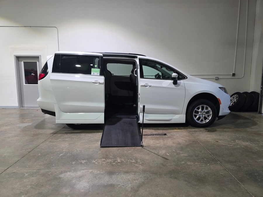 White Chrysler Voyager with Vantage Mobility Side Entry Manual In Floor conversion
