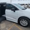 White Chrysler Pacifica with BraunAbility Side Entry Automatic Fold Out conversion