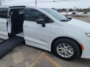 White Chrysler Pacifica with BraunAbility Side Entry Automatic Fold Out conversion